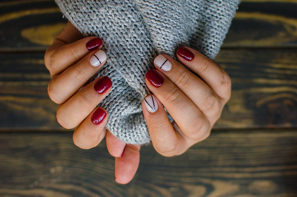 Burgundy manicure with accent nail