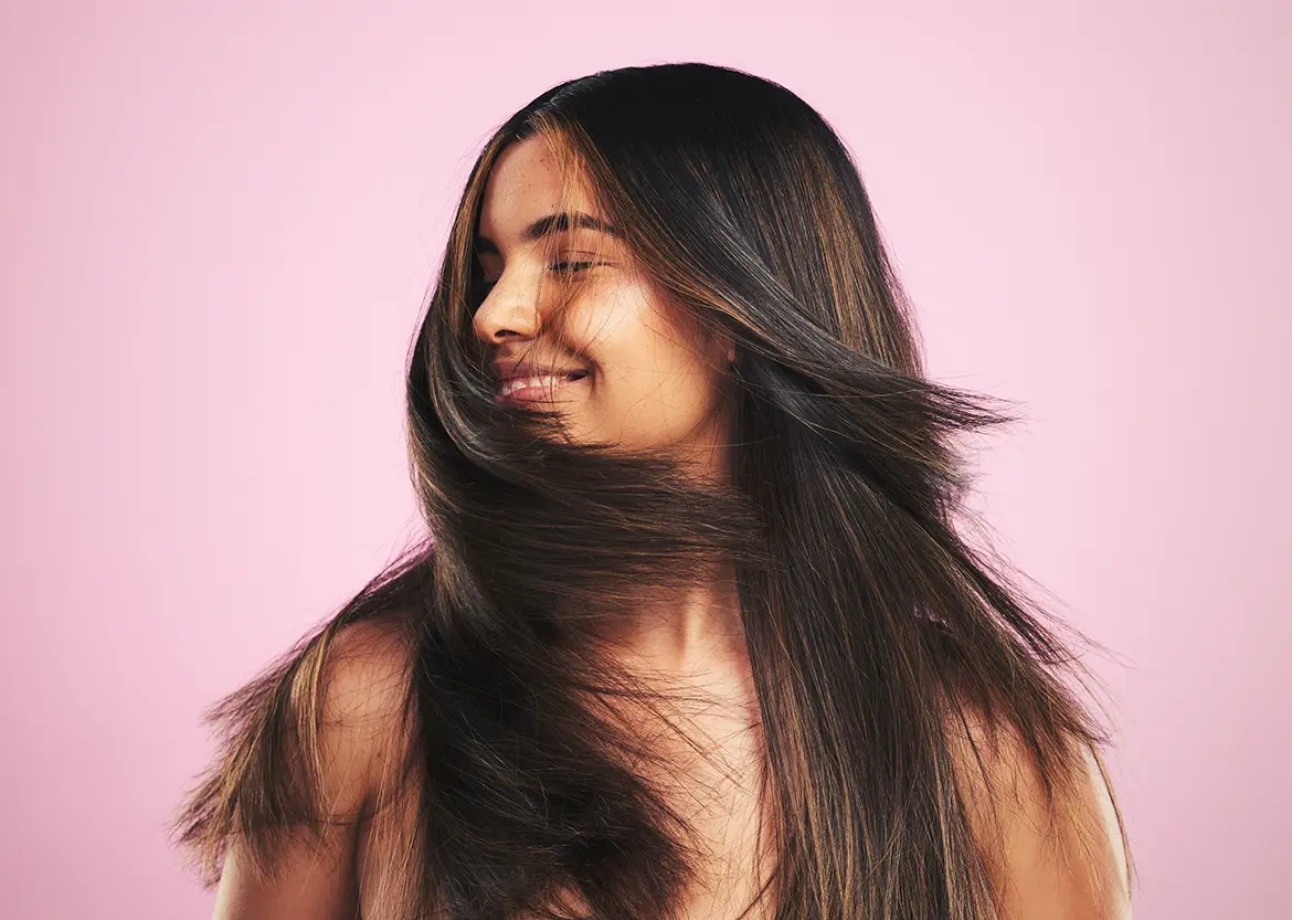 A girl with shiny, thick hair